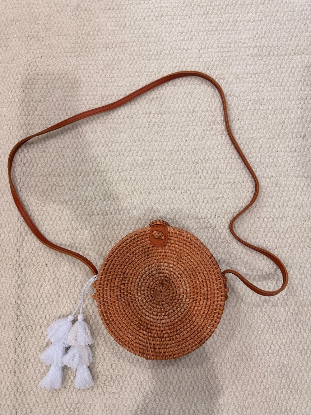 Round Tan Woven Crossbody Bag with White Tassels